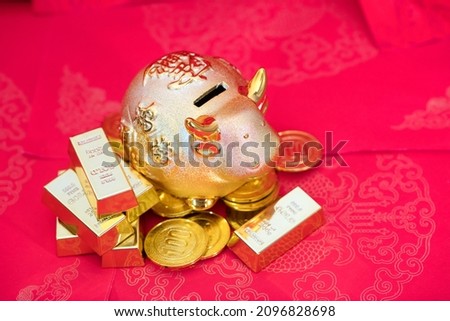 Taurus and gold on a red background. The Chinese character in the picture means "Lucky Strike"