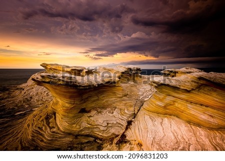 Rock formation and Thunderstorm in Kamay Botany Bay National Park Royalty-Free Stock Photo #2096831203