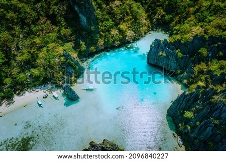 Amazing aerial view of turquoise Cadlao lagoon hopping island El Nido Palawan Philippines. Stunning nature place Royalty-Free Stock Photo #2096840227