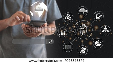 Businessman using on smartphone as concept. Digital marketing media (website ad, email, social network, SEO, video, mobile app) in virtual globe shape diagram.