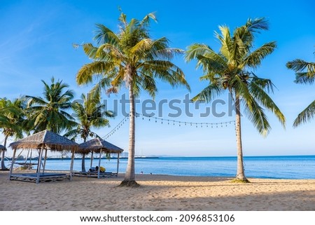 Na Jomtien Beach Pattaya Thailand, white tropical beach during sunset in Pattaya Najomtien. Palm trees at the beach Royalty-Free Stock Photo #2096853106