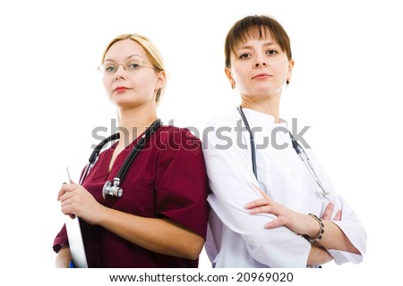Two beautiful doctors on white isolated background