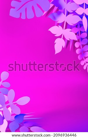 Trendy 3d pink and purple holographic neon colored scene with handmade paper cut jungle plants leaves decor. Cosmetics or beauty product promotion mockup showcase. Frame with empty copy space