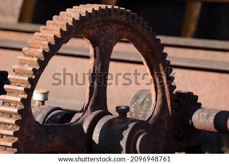 Rusty mining machinery. abandoned old tin mining equipment.