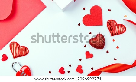 Valentine card. Red heart, romantic gift on love white background with copy space. Valentines day gift decoration. Flatlay banner