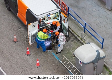 inspecting a pipeline with a robot or technical piping or robot inspection or sewer inspection with an automatic machine Royalty-Free Stock Photo #2097033076
