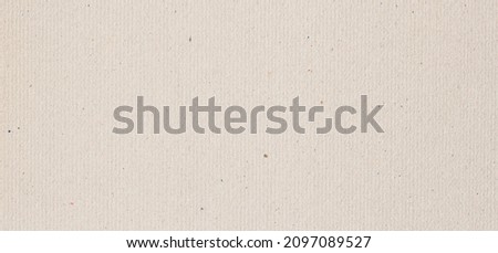 Natural craft paper texture, cardboard background close-up, copy space Royalty-Free Stock Photo #2097089527