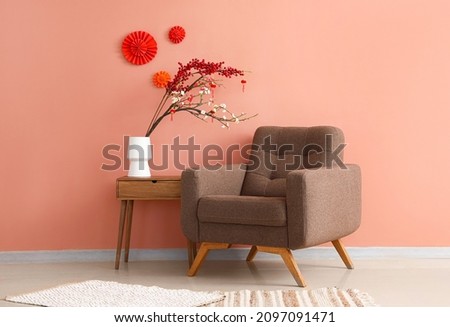 Interior of modern room decorated for Chinese New Year celebration Royalty-Free Stock Photo #2097091471
