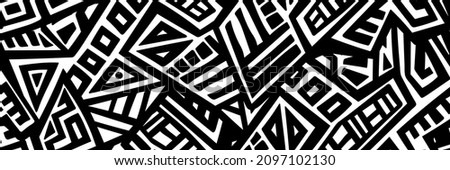 Unique Geometric Vector Seamless Pattern made in ethnic style. Aztec textile print. African traditional design. Creative boho pattern. Perfect for site backgrounds, wrapping paper and fabric design. Royalty-Free Stock Photo #2097102130