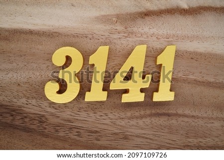 Golden Arabic numerals 3141 on a dark brown to white wood grain background.
