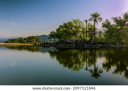 Long exposure shot at Bureh beach lake, Sierra Leone Royalty-Free Stock Photo #2097121846