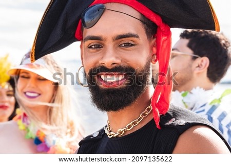 Carnaval in Brasil, portrait of black man celebrating brazilian party in costume