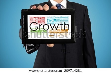 businessman presenting something on tablet - Growth