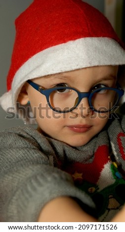 Little boy in santa's hat