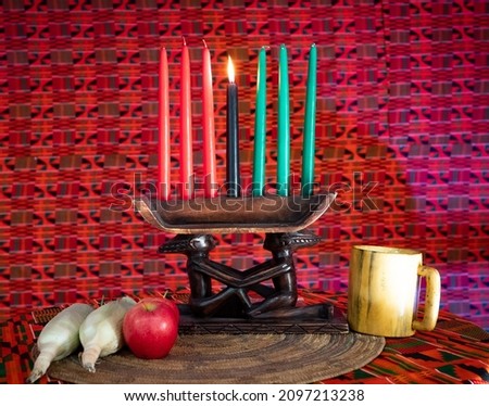 Colorful Kwanzaa kinara candle 
display 