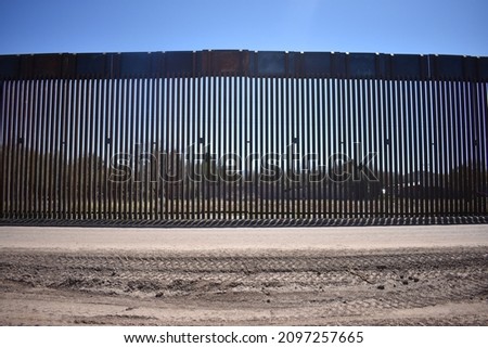 Border wall construction on the USA Mexico border in the Sonoran Desert in Arizona Royalty-Free Stock Photo #2097257665