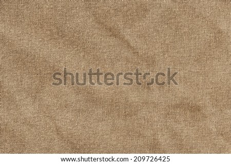Photograph of unprimed artist's Cotton duck coarse grain canvas, crumpled grunge texture sample