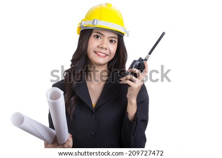 Asian Engineer hold radio FM for call and work with team with white background