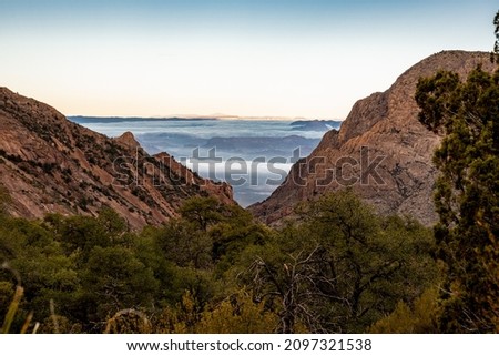 Fog Below the Window from the Boot Canyon Trail in Big Bend National Park Royalty-Free Stock Photo #2097321538