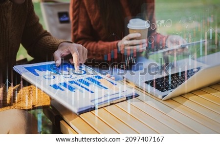 Business team working with digital finance marketing chart, Future technology innovation interface icons, Digital transformation stock marketing concept, blurred background. 