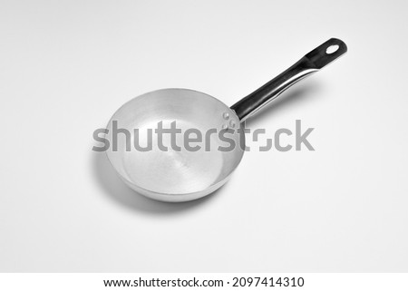 Aluminium frying pan isolated on white background.High resolution photo.Top view. Mock-up.