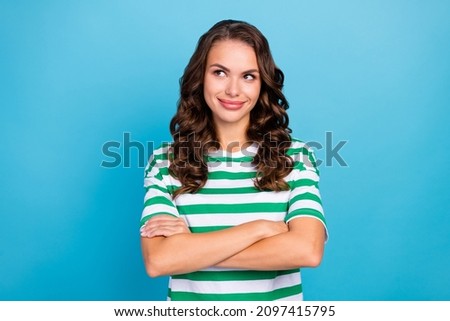 Photo of hr brunette wavy millennial lady crossed palms wear green t-shirt isolated on blue color background