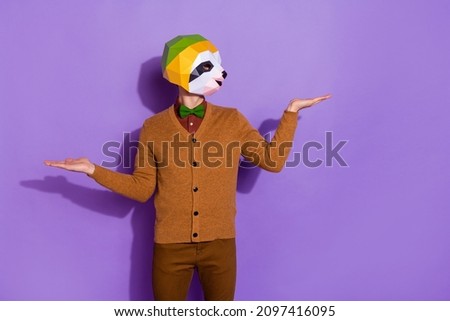 Photo of young man advert proposition solution recommend sale promoter isolated over violet color background