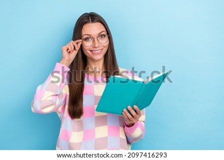 Photo of intelligent lady read literature prepare pass exam wear specs sweater isolated blue color background