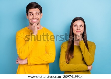 Photo of clever intelligent couple look each other prepare plan wear yellow casual outfit isolated blue color background