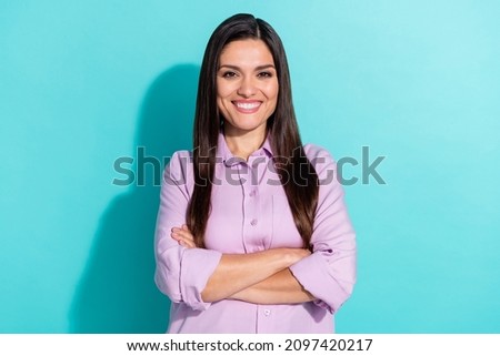 Photo of brunette seo mature lady crossed arms wear violet outfit isolated on turquoise color background