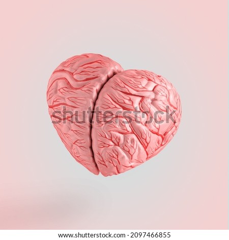 2022. Minimal love symbol scene made of orange-pink heart-shaped brain isolated on pastel beige background. Women’s day or valentine’s day card. Surreal abstract creative concept. Love thoughts idea. Royalty-Free Stock Photo #2097466855