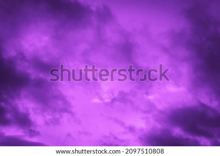 Purple pink sky with clouds.  Background with copy space for design.                               