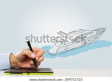 Close up of man hand drawing in tablet