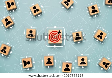 Red dartboard and black arrow connection linkage with human icon for customer focus target group and customer relation management concept. Royalty-Free Stock Photo #2097533995