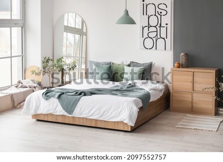 Modern interior of light bedroom with mirror Royalty-Free Stock Photo #2097552757