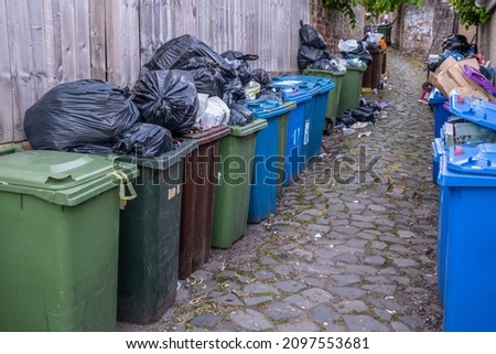 Overflowing Rubbish (Garbage) In An Alleyway In Glasgow During A Strike Action Royalty-Free Stock Photo #2097553681