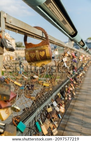 Bridge of lovers with hanging padlocks.