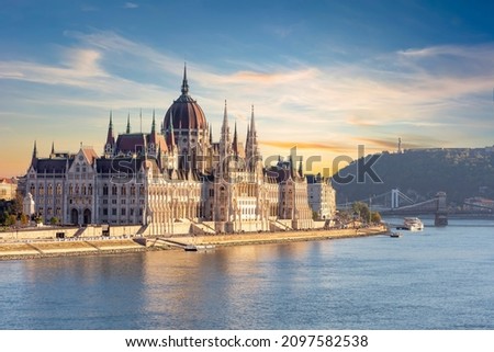 Hungarian parliament building at sunset, Budapest, Hungary Royalty-Free Stock Photo #2097582538
