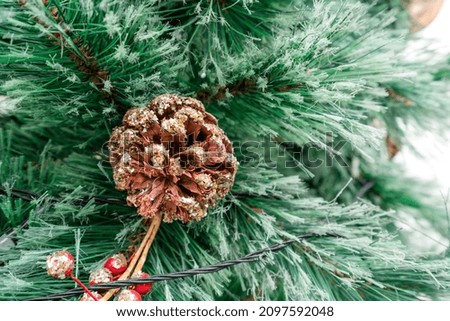 Close up of decorated Christmas tree decorations with red-gold circle balls and bokeh (soft focus), for New year or Christmas interior decoration at home or in the Studio