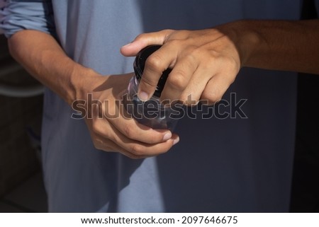Female hands opening a glass jar. Royalty-Free Stock Photo #2097646675