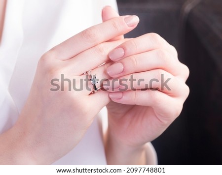 Diamond wedding ring on woman hand Royalty-Free Stock Photo #2097748801