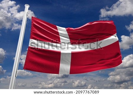 Flag of Denmark The flag of Denmark is red with a white Scandinavian cross that extends to the edges of the flag;