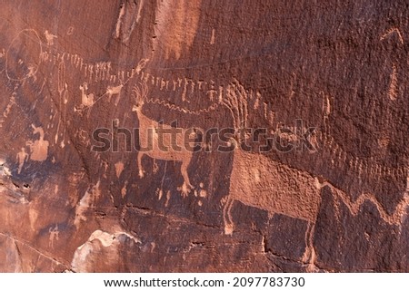 The Procession Panel, a well-known Ancetral Puebloan petroglyph panel near the top of Comb Ridge in Bears Ears National Monument, Utah. Royalty-Free Stock Photo #2097783730