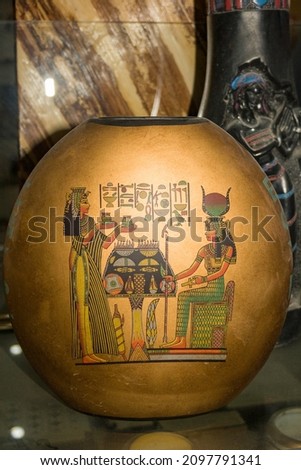 Egyptian vase with a drawing from the life of the pharaohs.