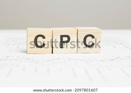 CPC wooden blocks word on grey background. CPC - short for Cost Per Click , information concepts.