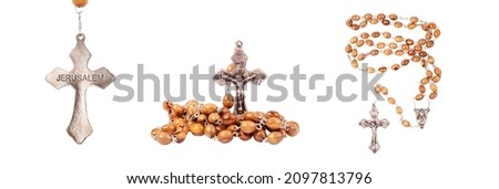 Set of an wooden rosary isolated on white background. Royalty-Free Stock Photo #2097813796