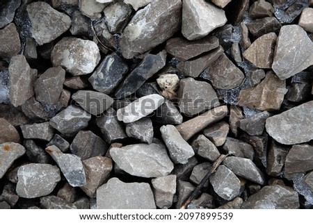 cool toned mini rocks background texture 