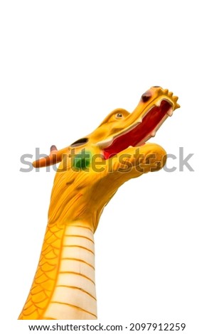 Toy giraffe face on the isolated white background close up
