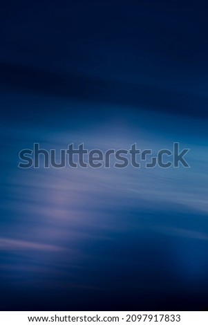 Creative blue wallpaper with sky pattern. Dark shapes and texture, gradient effect, smooth and soft colors. No selective focus, defocused background.