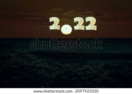 Happy new year 2022, moon at night time with 2022